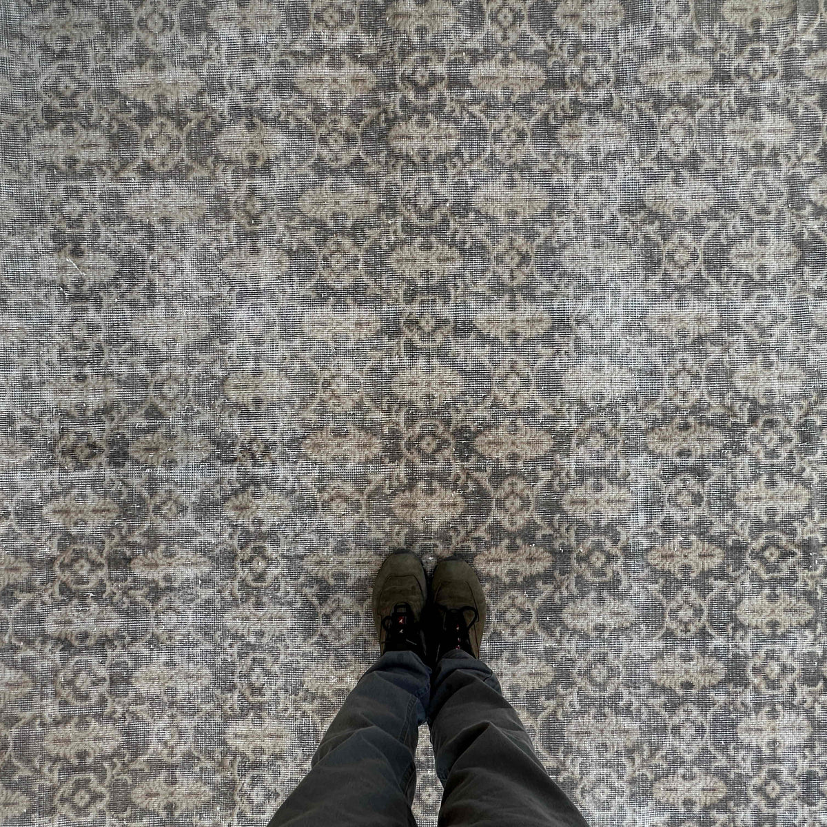 1970s gray vintage turkish rug with traditional design, hand-knotted weave and low pile.