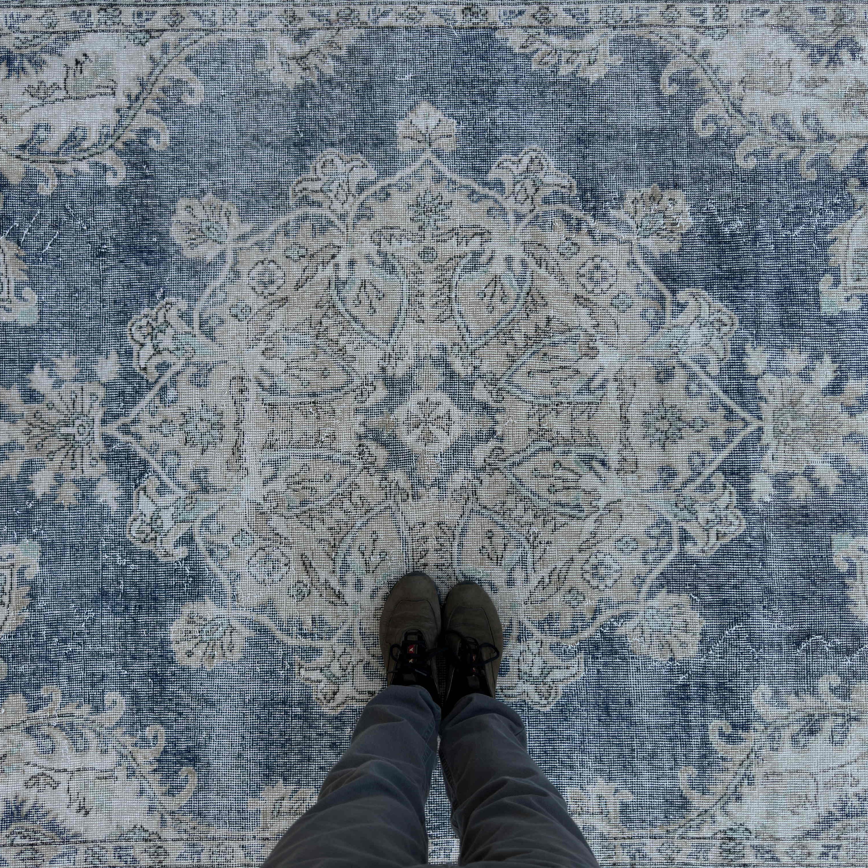 1970s beige vintage turkish rug with neutral and medallion design, hand-knotted weave and low pile.