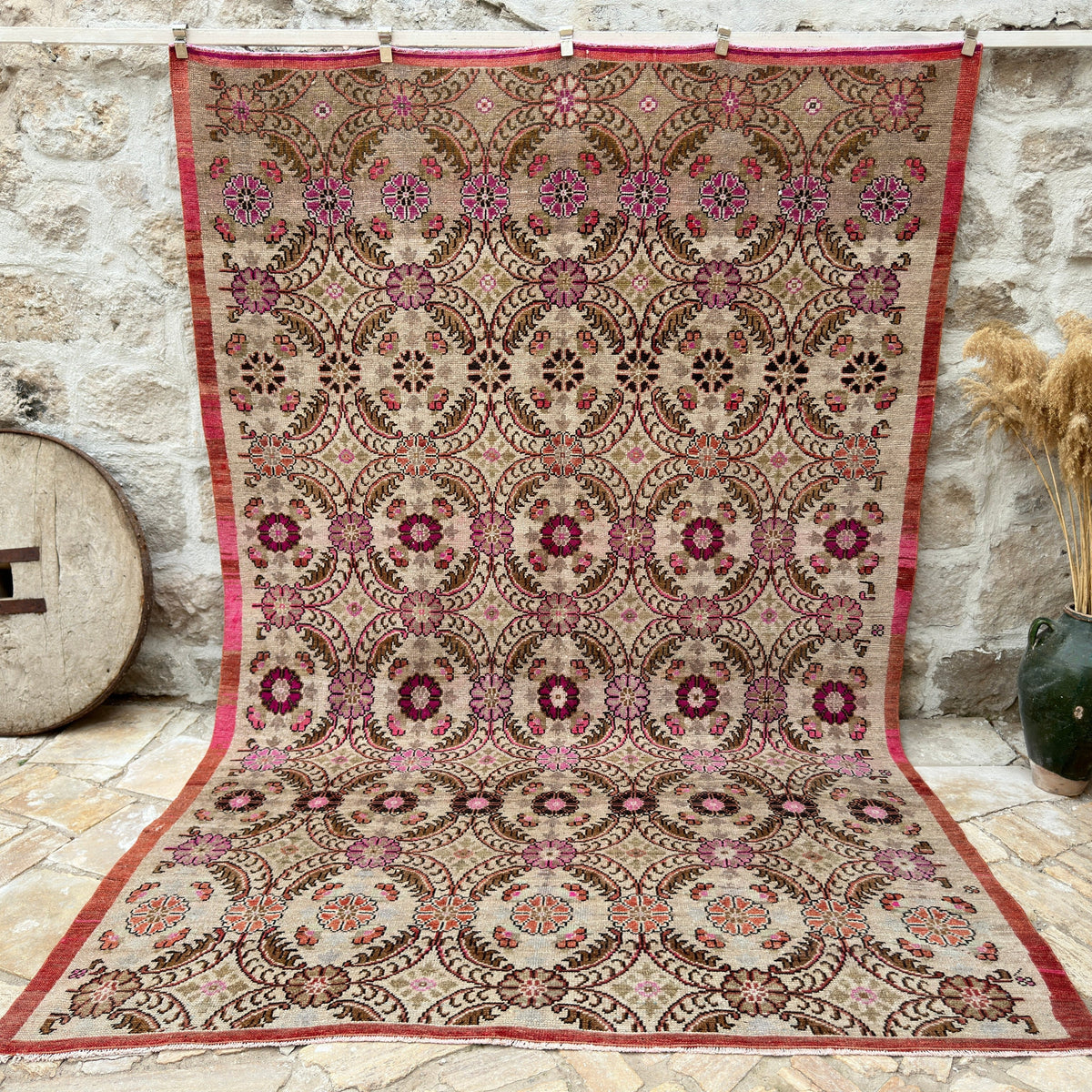 Pink 7' x 11' vintage turkish rug with floral and geometric design, handmade in Turkey – Elliott.