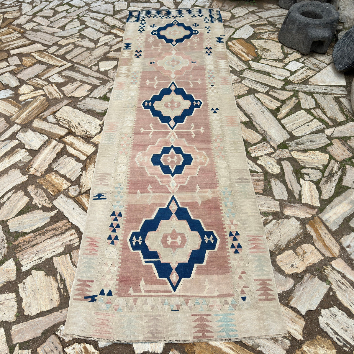 Brown 3' x 11' vintage turkish runner rug in wool and cotton, shown on the floor.