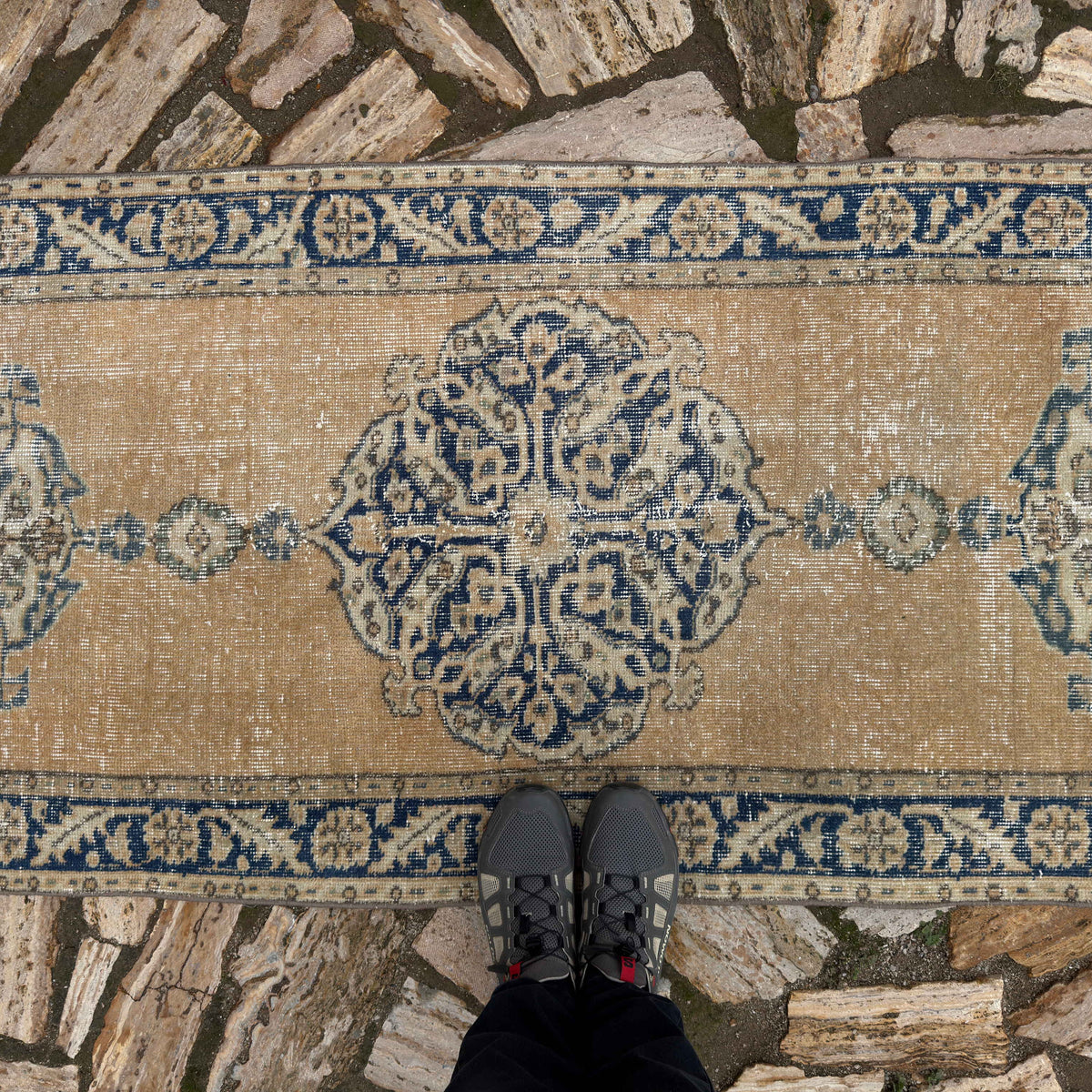 1970s pale yellow vintage turkish runner rug with medallion design, hand-knotted weave and low pile.