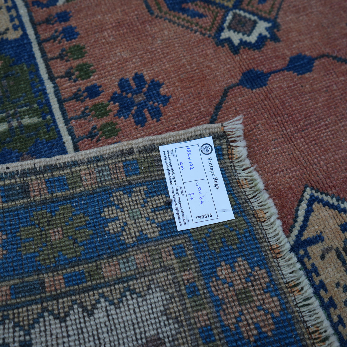 Blue 4' x 6' vintage Turkish wool rug from the 1970s with traditional design.