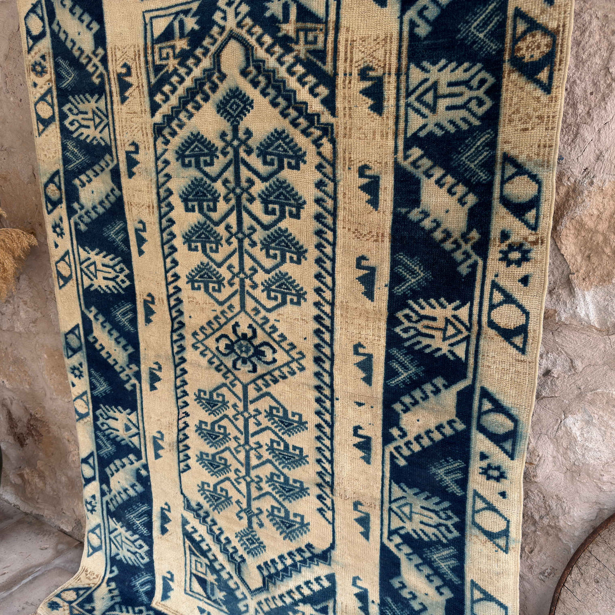 1970s blue vintage Turkish wool rug with neutral design, hand-knotted weave and low pile.