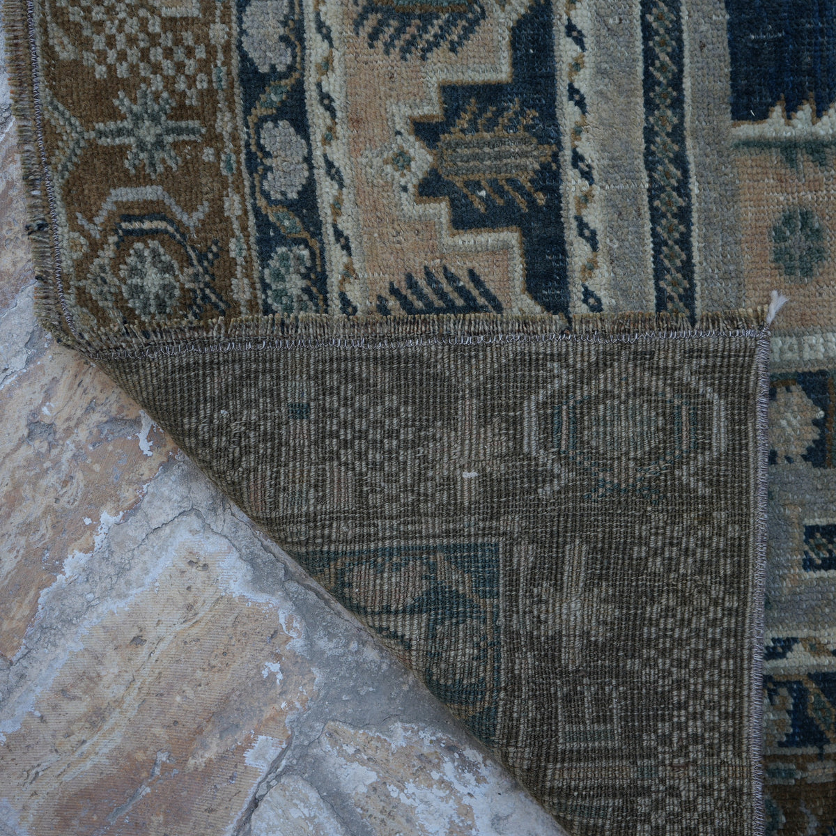 1970s blue vintage Turkish wool rug with neutral design, hand-knotted weave and low pile.