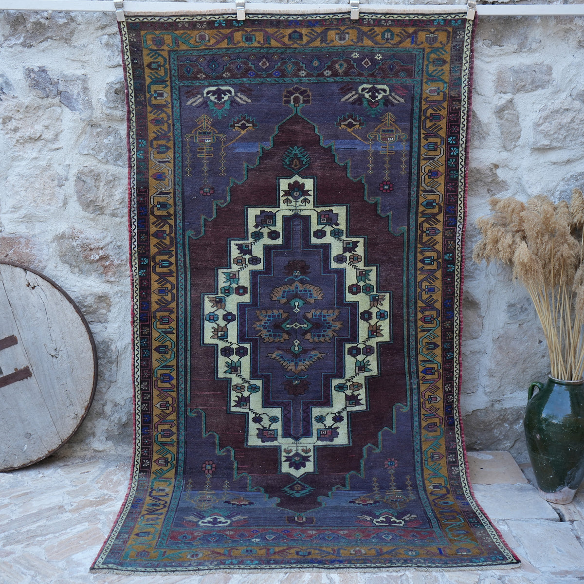 Purple 5' x 9' vintage wool rug with traditional design, handmade in Turkey – Candis.