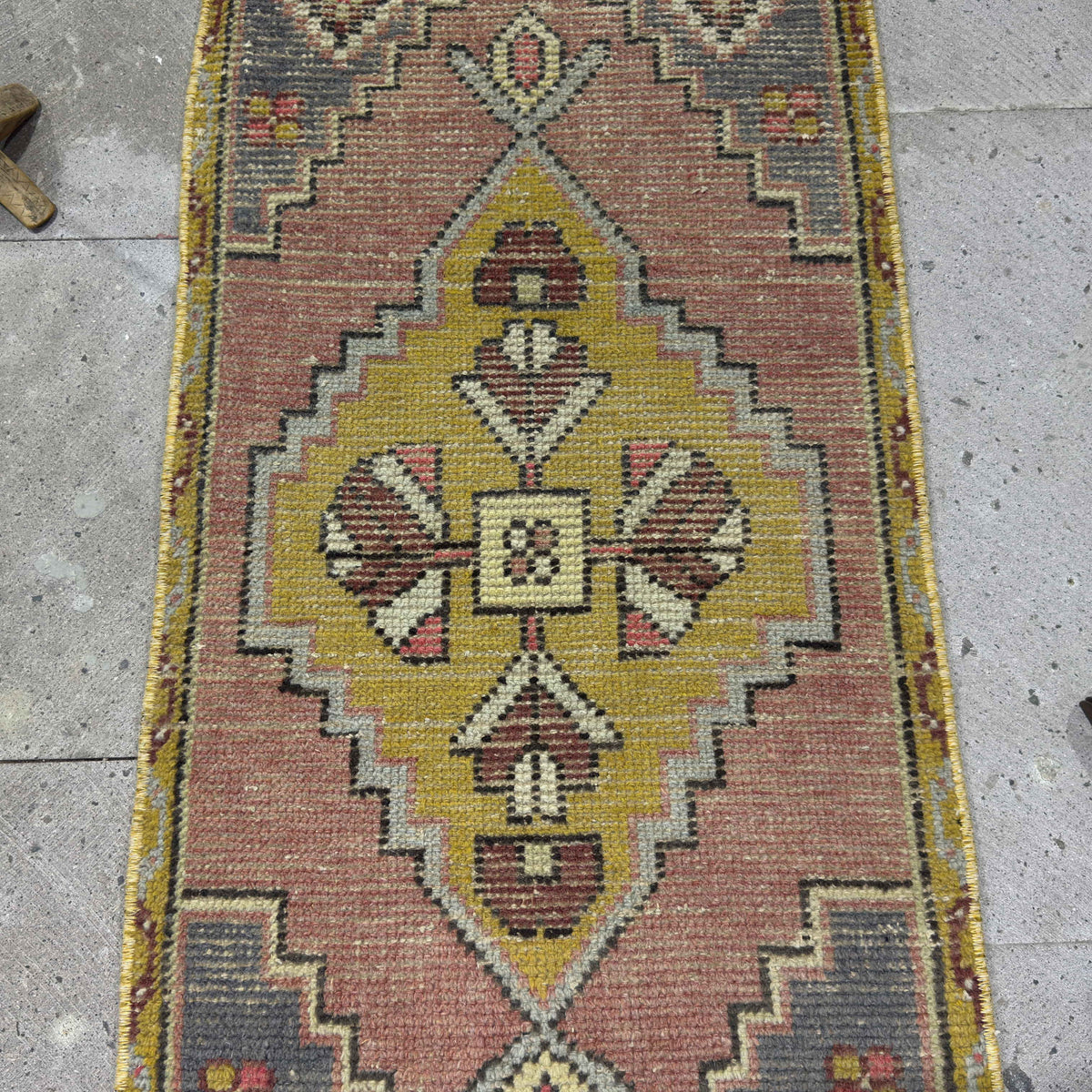 1970s yellow Turkish wool traditonal rug with traditional design, hand-knotted weave and low pile.