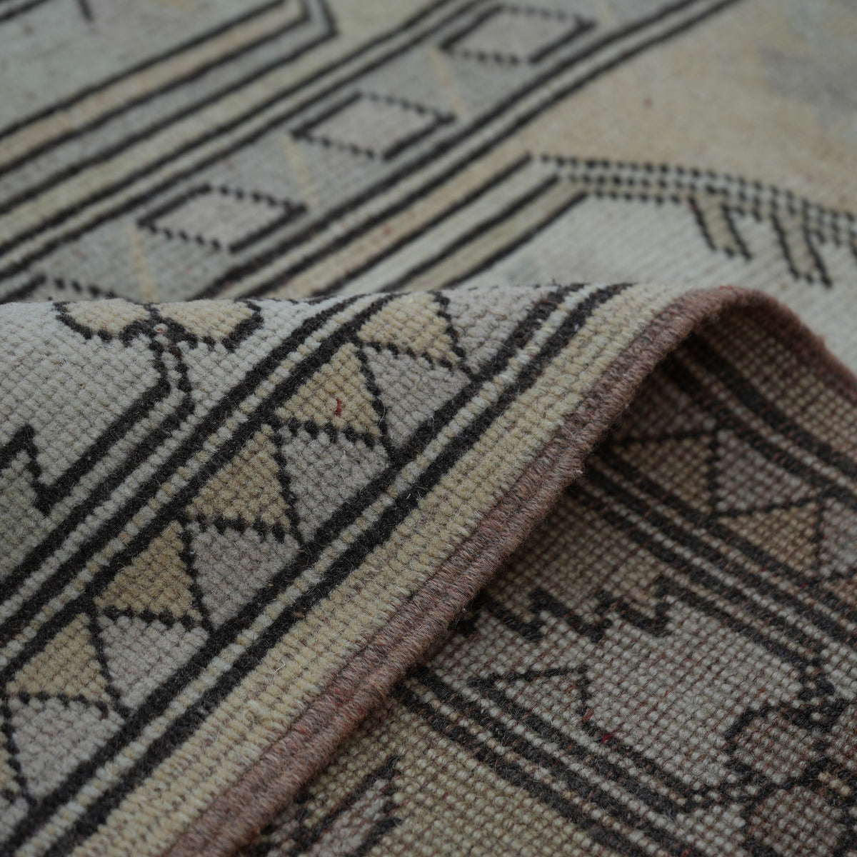 Additional view of the yellow Turkish wool vintage rug, hand-knotted in wool.