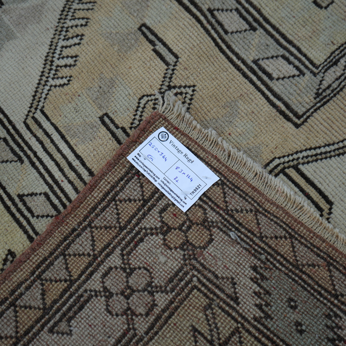 Yellow 8' x 11' Turkish wool vintage rug from the 1970s with geometric design.