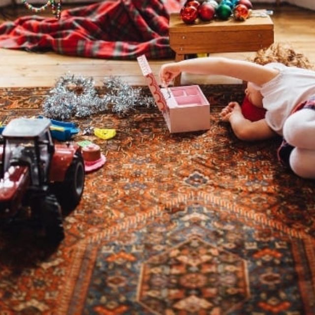 Vintage rugs styled in a kids room or nursery