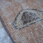 Pale Orange 3' x 7' Turkish art decor rug in wool and cotton, shown on the floor.