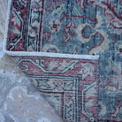 1970s blue Turkish authentic vintage rug with traditional design, hand-knotted weave and low pile.