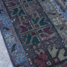 Pale Blue 4' x 7' Turkish authentic vintage rug in wool, shown on the floor.