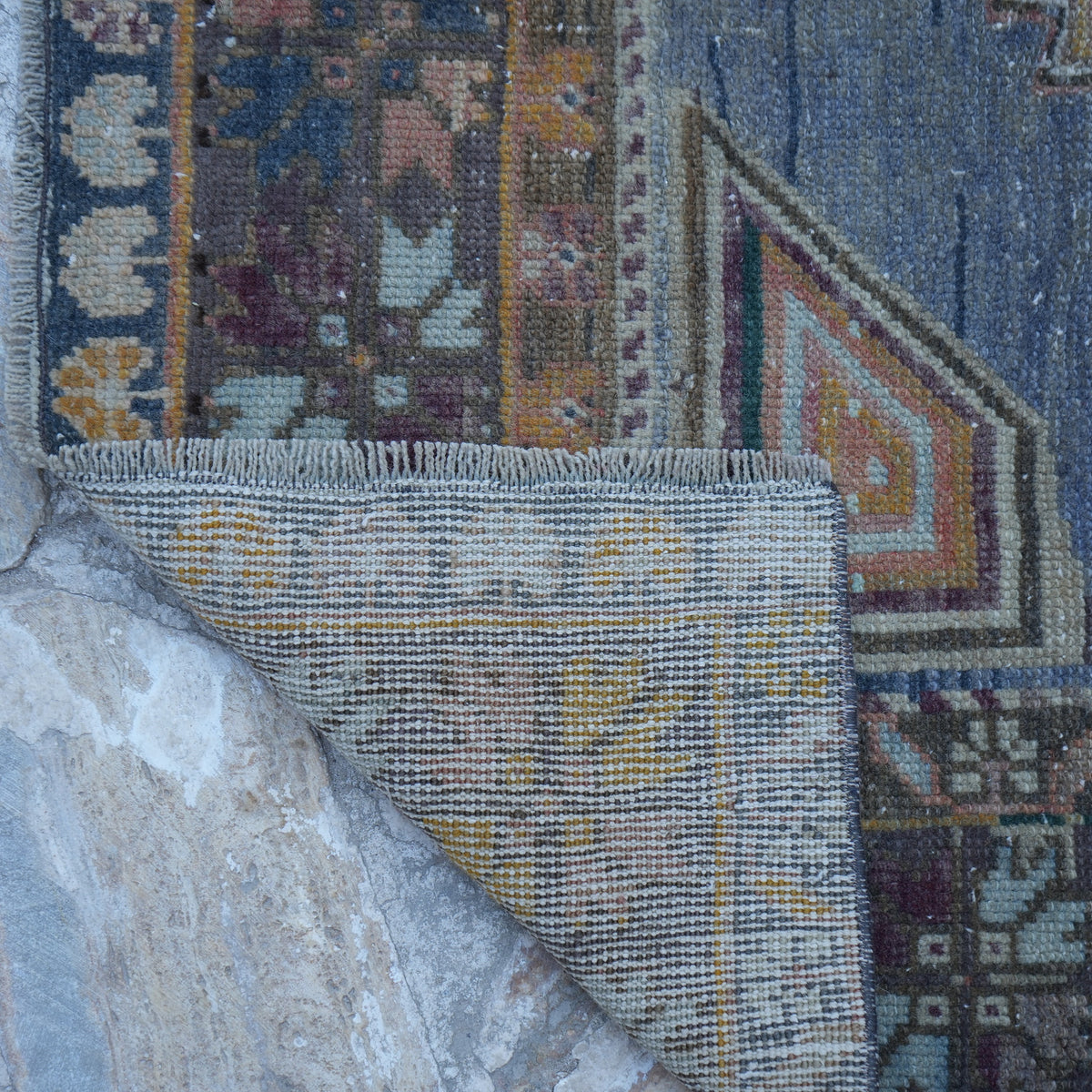 1970s pale blue Turkish authentic vintage rug with traditional design, hand-knotted weave and low pile.