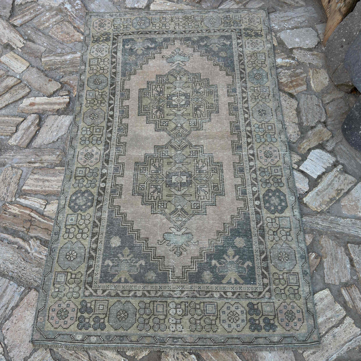 Beige 3' x 6' Turkish distressed rug in wool and cotton, shown on the floor.