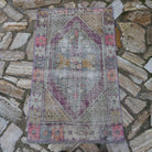 Pale Purple 3' x 4' Turkish distressed vintage rug in wool and cotton, shown on the floor.