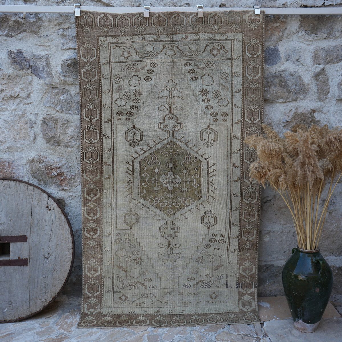 Brown 4' x 7' distressed vintage rug with traditional design, handmade in Turkey – Taryn.