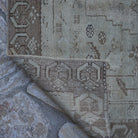 Additional view of the brown Turkish distressed vintage rug, hand-knotted in wool.
