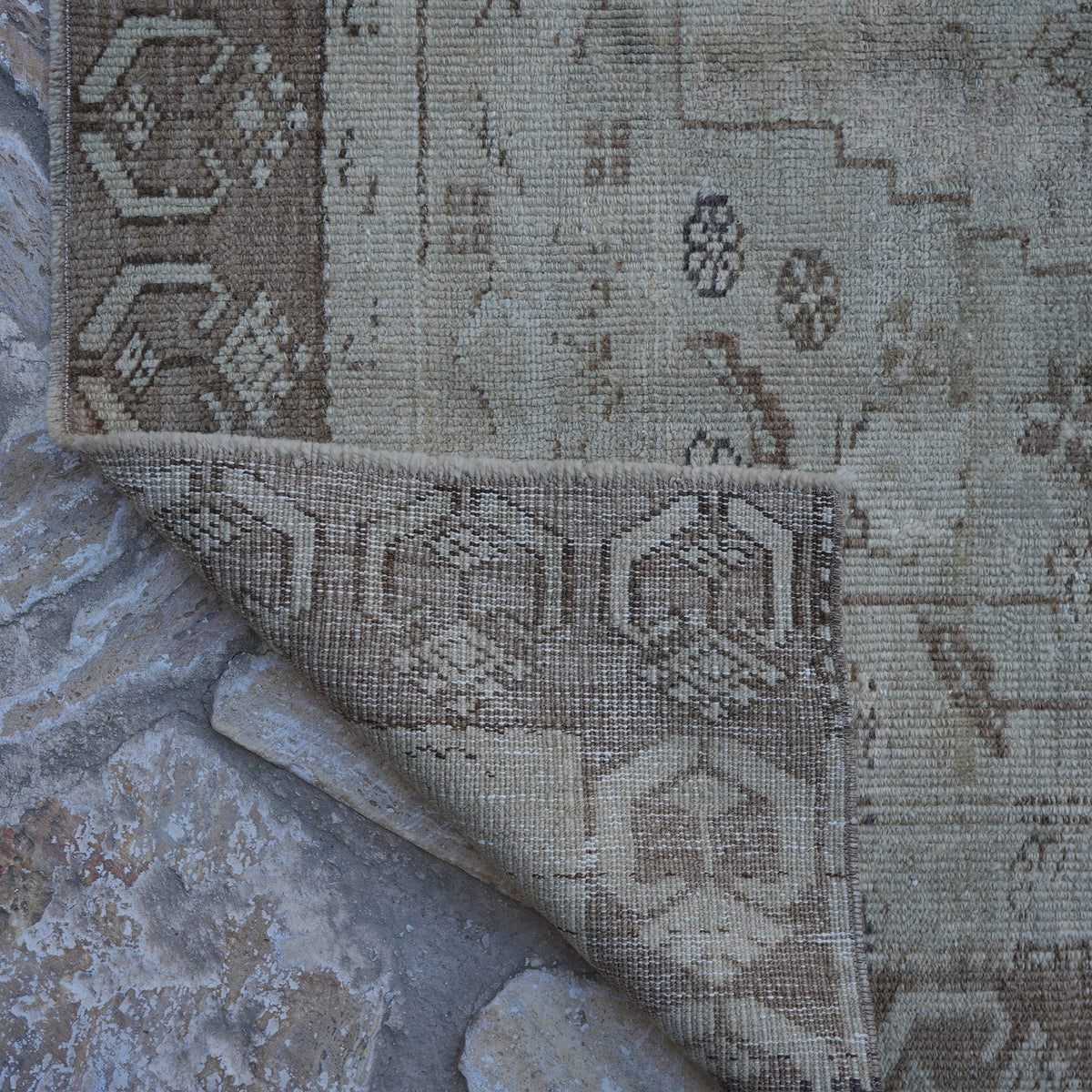 Additional view of the brown Turkish distressed vintage rug, hand-knotted in wool.