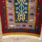 Blue 3' x 4' Turkish flatweave rug in wool and cotton, shown on the floor.