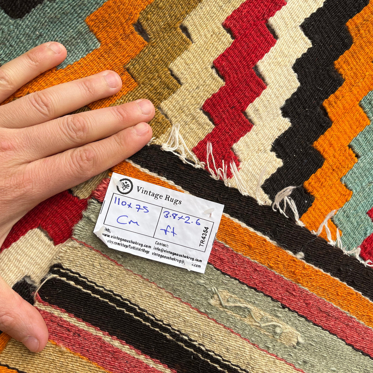 1970s orange Turkish flatwoven rugs with traditional design, flatweave construction and low pile.