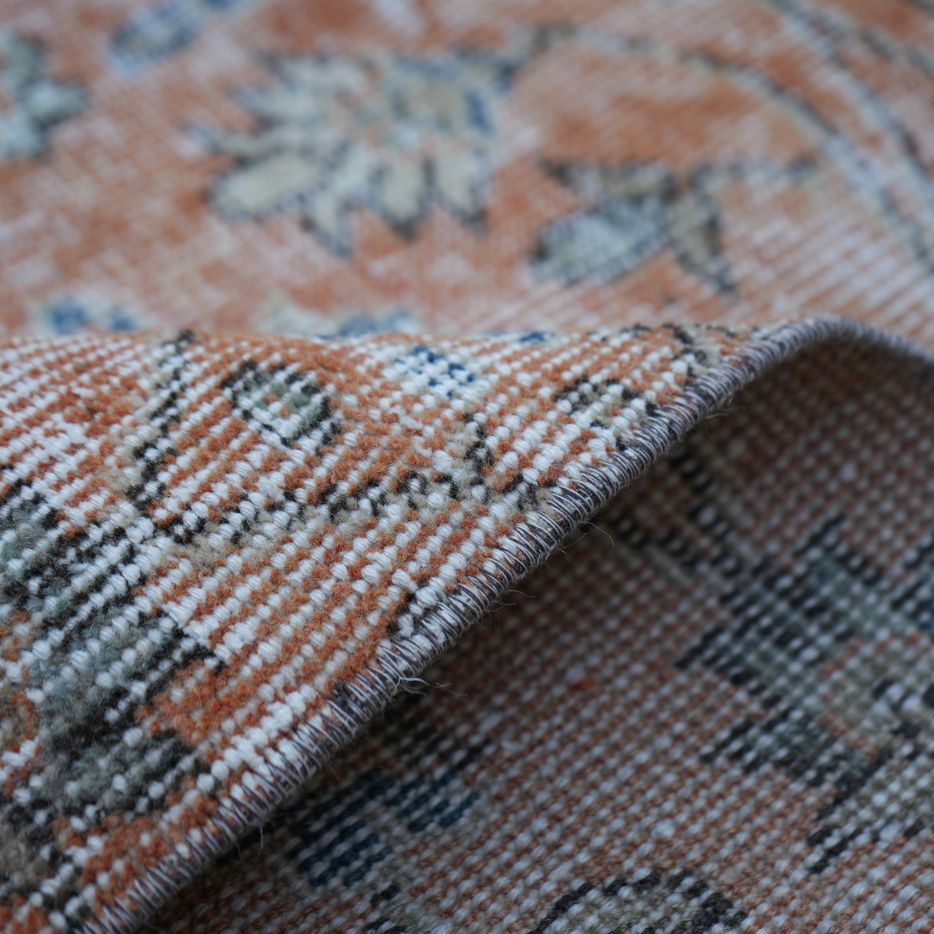 Additional view of the orange Turkish floral runner rug, hand-knotted in wool and cotton.