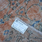 Orange 3' x 11' Turkish floral runner rug from the 1970s with floral design.