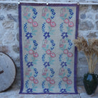 Beige 4' x 7' floral vintage rug with floral design, handmade in Turkey – Joete.