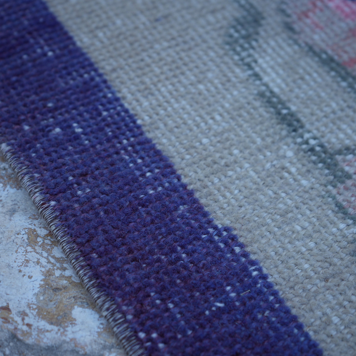 Beige 4' x 7' Turkish floral vintage rug in wool and cotton, shown on the floor.