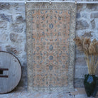 Orange 4' x 7' floral vintage rug with floral design, handmade in Turkey – Elga.