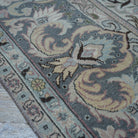 1970s pink hand-knotted persian rug with medallion design, hand-knotted weave and low pile.