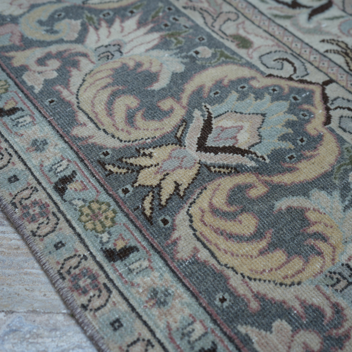 1970s pink hand-knotted persian rug with medallion design, hand-knotted weave and low pile.