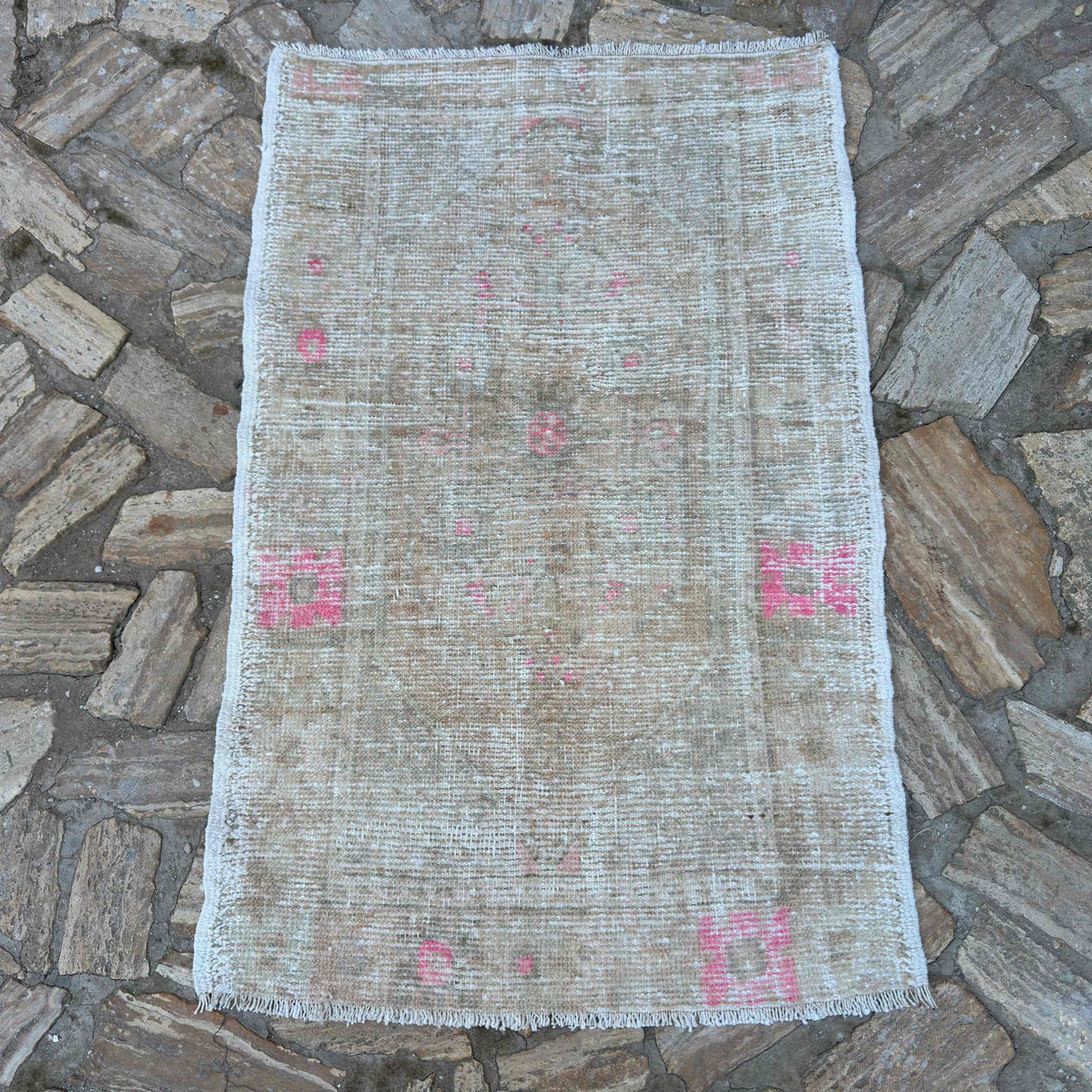 Beige 3' x 4' Turkish hand-knotted rug in wool and cotton, shown on the floor.