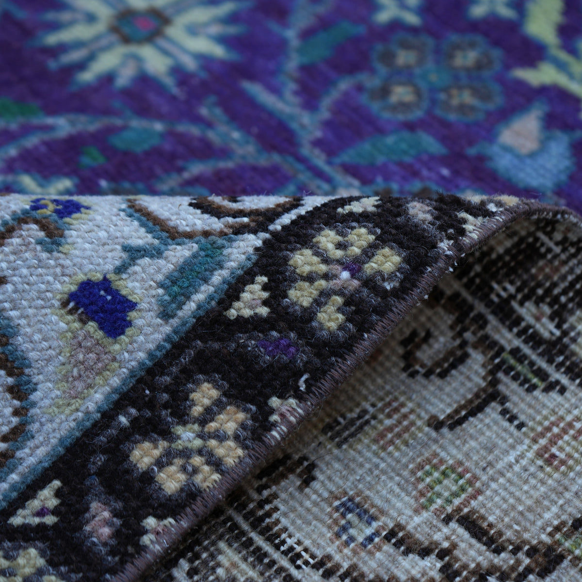 Additional view of the purple Turkish handknotted floral rug, hand-knotted in wool and cotton.