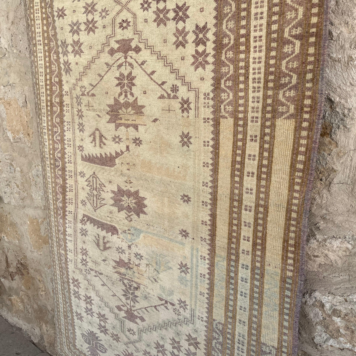 1970s pink Turkish handknotted rug with traditional design, hand-knotted weave and low pile.