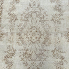 1970s beige Turkish handknotted rug with medallion design, hand-knotted weave and low pile.