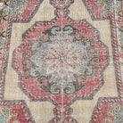 1970s red Turkish handknotted rug with traditional design, hand-knotted weave and low pile.