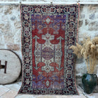 Purple 5' x 8' handknotted rug with geometric design, handmade in Turkey – Armistead.