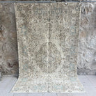 Green 5' x 9' handknotted rug with neutral design, handmade in Turkey – Pacey.
