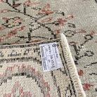 1970s pale green Turkish handknotted rug with medallion design, hand-knotted weave and low pile.