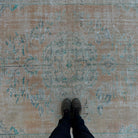 1970s orange Turkish handknotted rug with medallion design, hand-knotted weave and low pile.