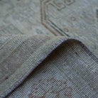 Additional view of the beige Turkish handknotted vintage rug, hand-knotted in wool and cotton.