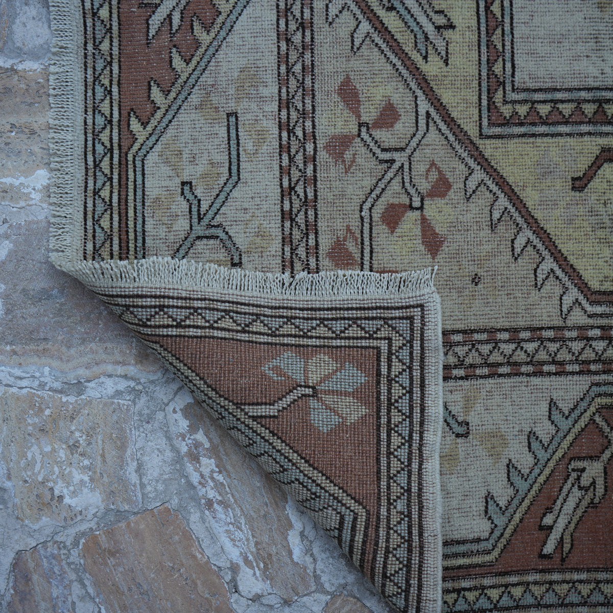 1970s beige Turkish handknotted wool rug with traditional design, hand-knotted weave and low pile.