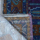 1970s blue Turkish handknotted wool rug with traditional design, hand-knotted weave and low pile.