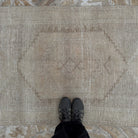 1970s beige Turkish handmade runner rug with neutral design, hand-knotted weave and low pile.