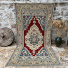Red 6' x 11' handmade traditinoal rug with traditional design, handmade in Turkey – Tiff.