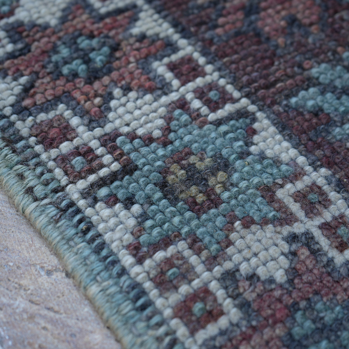 Colorful 5' x 12' Turkish handmade vintage carpet in wool, shown on the floor.