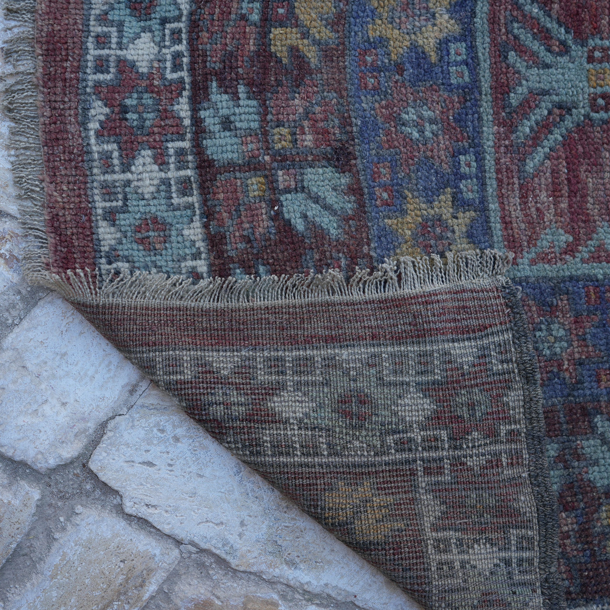 1970s colorful Turkish handmade vintage carpet with traditional design, hand-knotted weave and low pile.