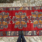 1970s red Turkish handmade vintage carpet with traditional design, hand-knotted weave and low pile.