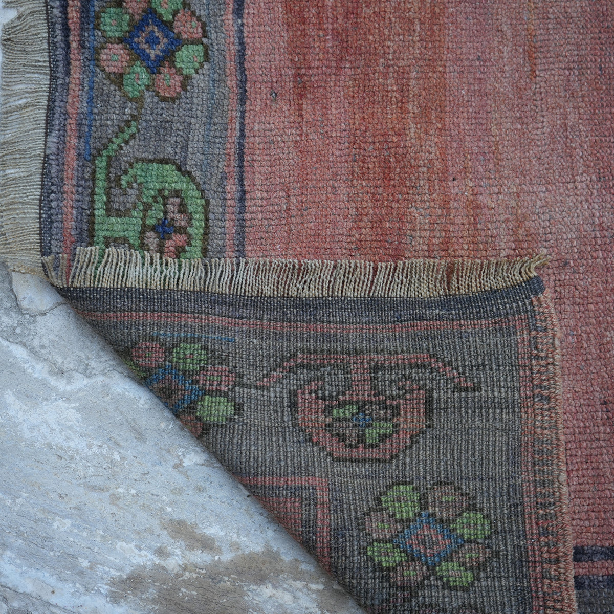 1970s red Turkish handmade vintage rug with traditional design, hand-knotted weave and low pile.