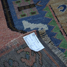 Red 6' x 11' Turkish handmade vintage rug from the 1970s with traditional design.